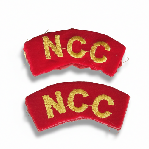 NCC Army shoulder arm title badge set with gold embroidered ‘NCC’ text on red fabric, curved design for cadet uniform, suitable for boys and girls.