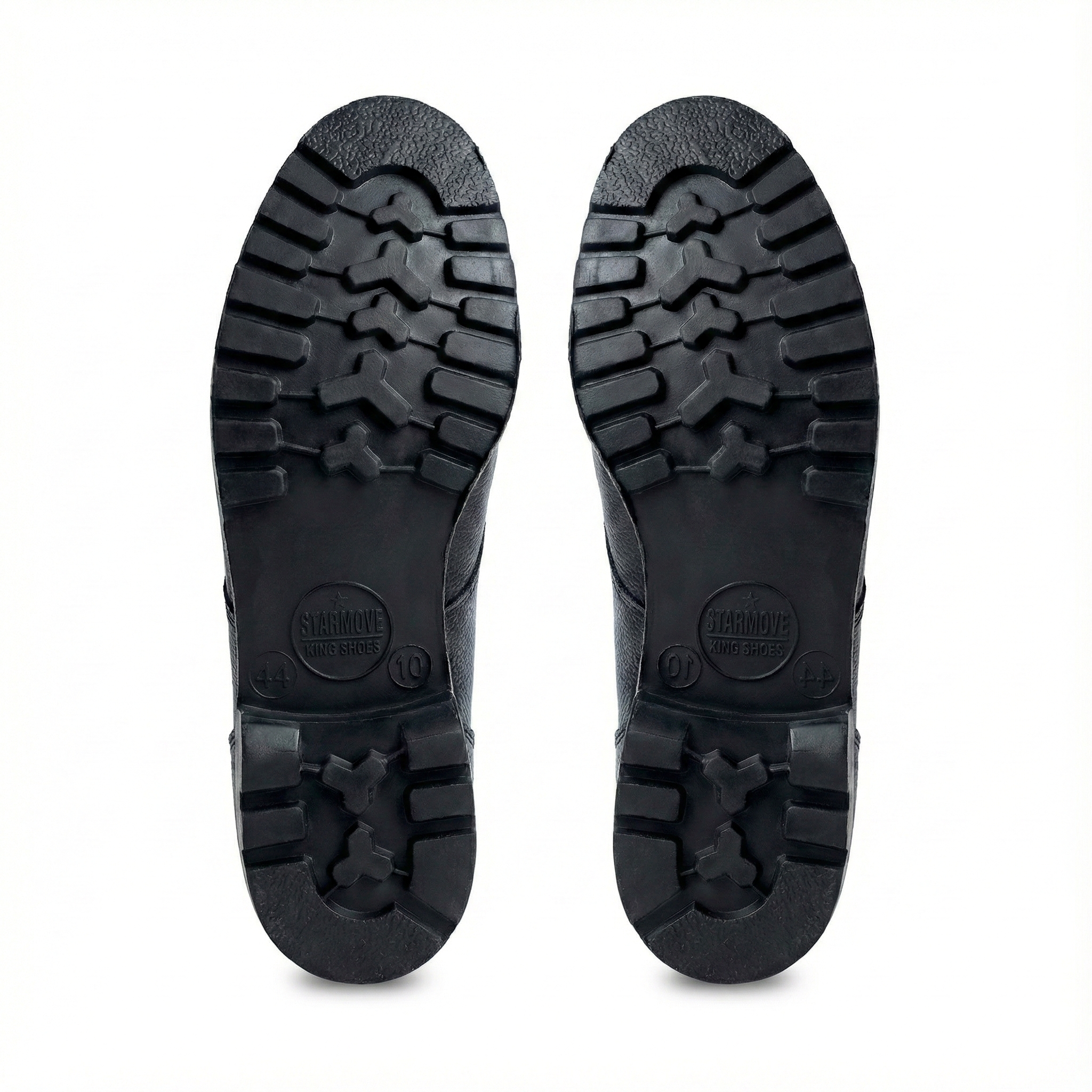 NCC DMS black leather boots outsole view showing rubber sole with deep grip pattern, durable anti-slip base designed for NCC parade, drill, and training use.