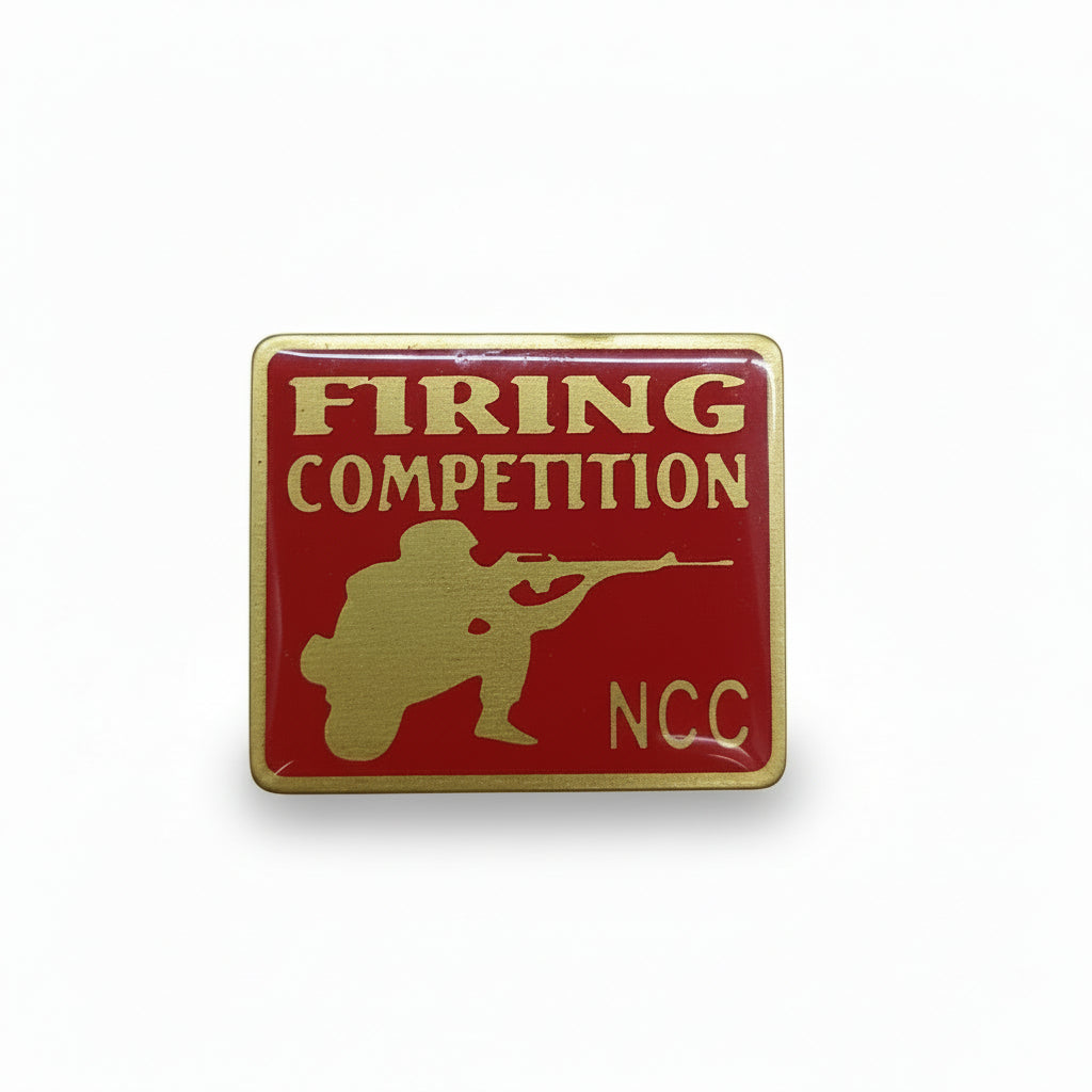 NCC Firing Competition Badge with shooter silhouette in red and gold metal finish