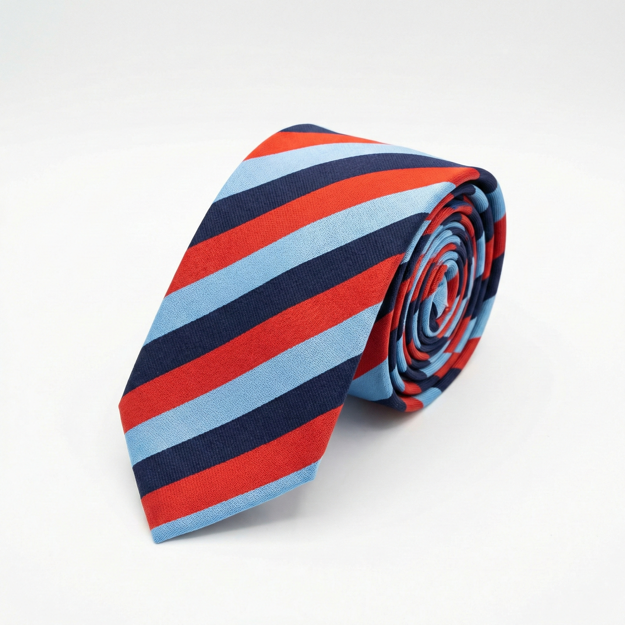 NCC ceremonial tie with red navy and sky blue diagonal stripes rolled view ncc online store