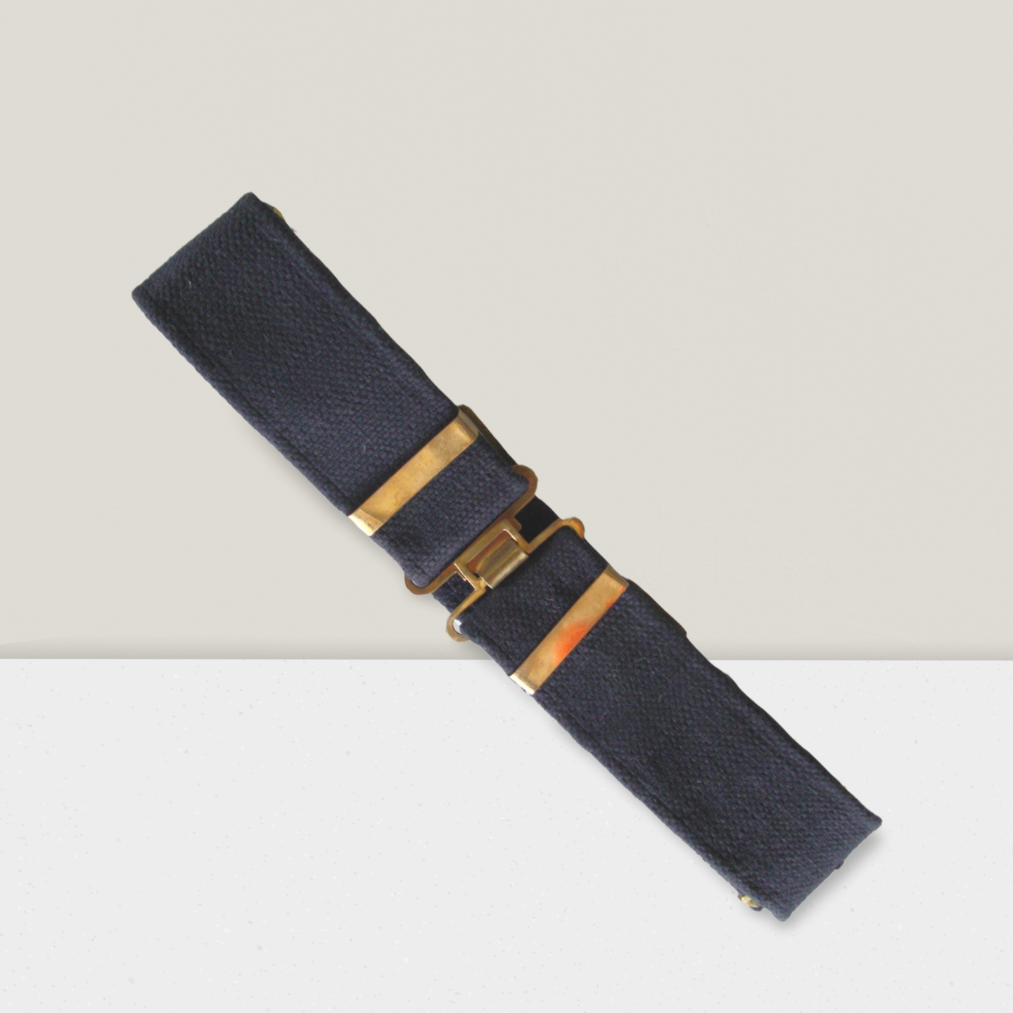 NCC cadet black web belt uniform belt with brass buckle, two brass runners, and belt loops, durable cotton-nylon fabric with metal buckle and adjuster clasp.